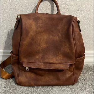 Brown leather backpack